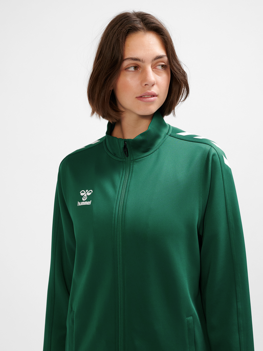 hmlCORE XK POLY ZIP SWEAT WOMAN, EVERGREEN, model
